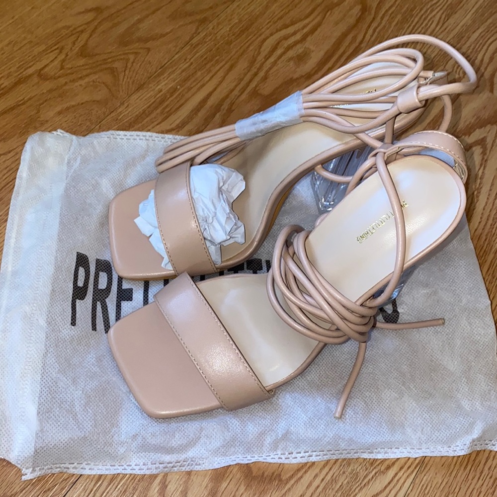Pretty Little Things clear block nude heels